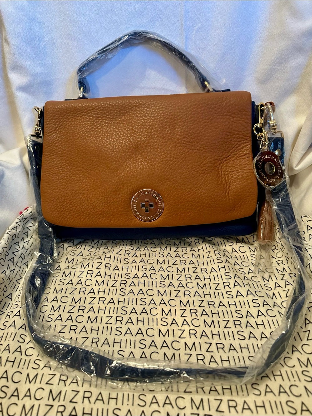 Isaac Mizrahi Tan and Navy Leather Satchel with Tassel Charm and Top Handle